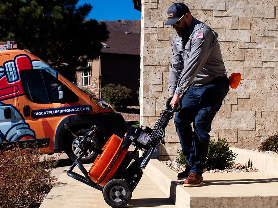 Big Cat tech with sewer equipment