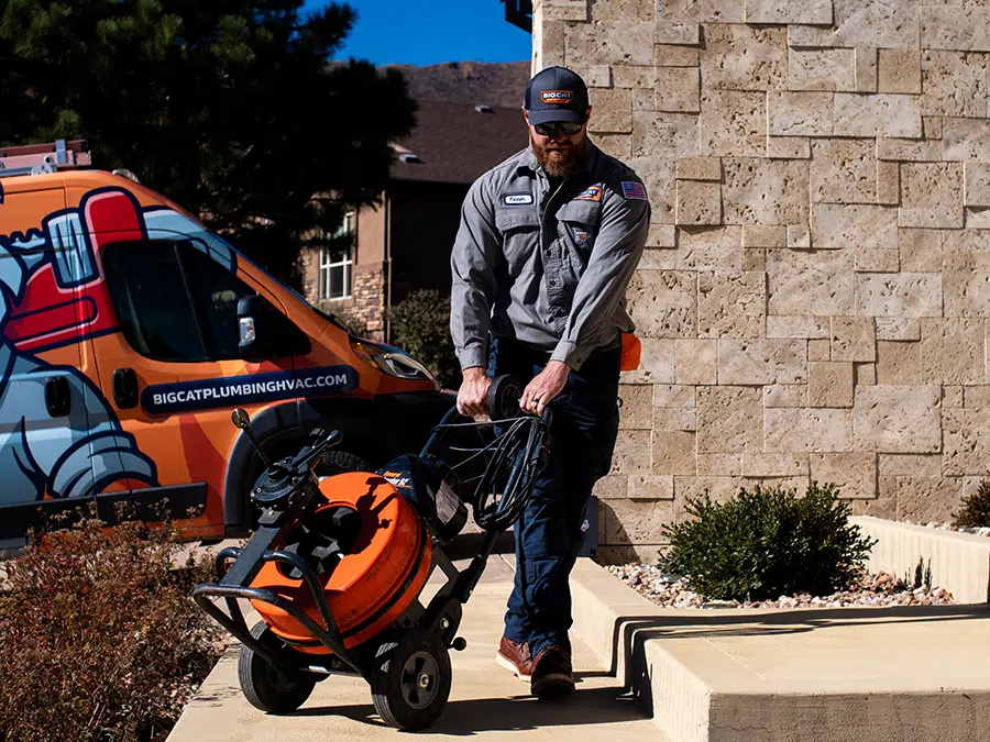 Big Cat tech with sewer equipment