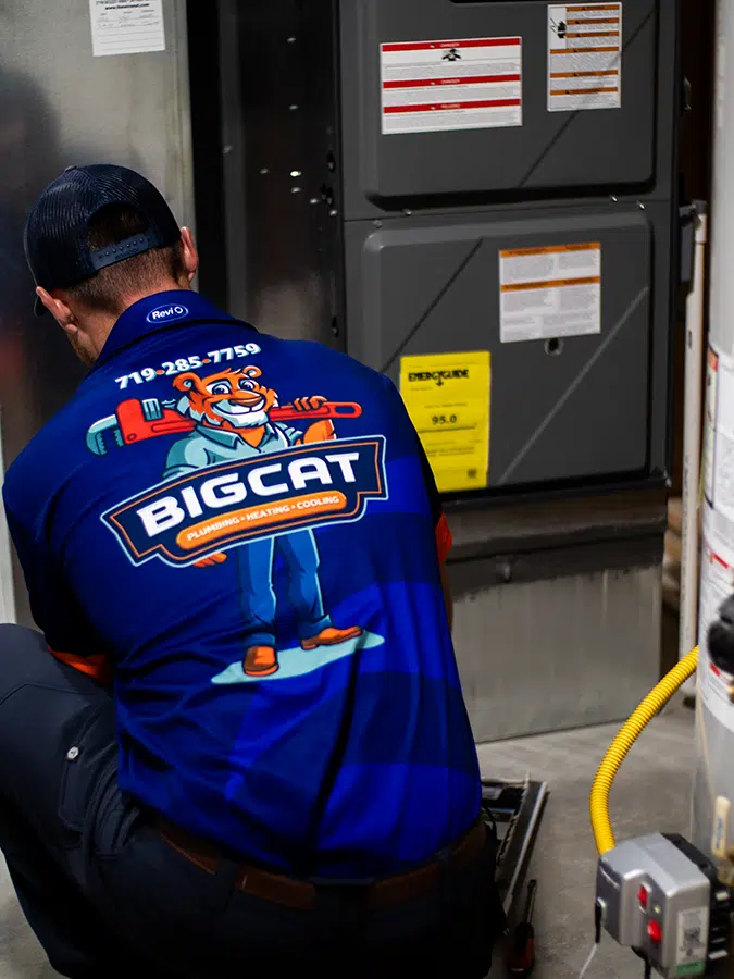 technician installing furnace in Colorado Springs, CO.